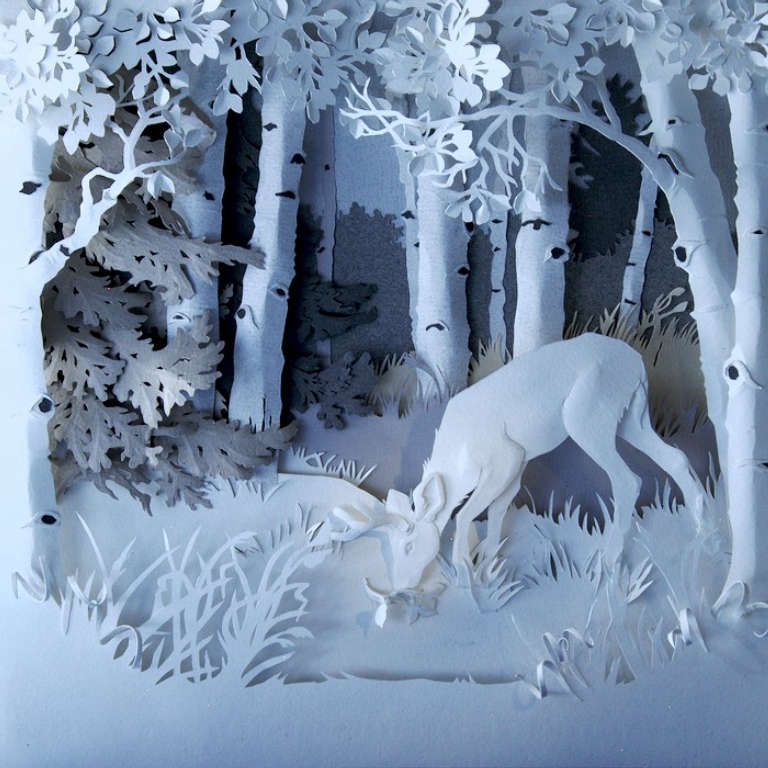 paper sculpture illustration of deer grazing at dusk under Aspen trees