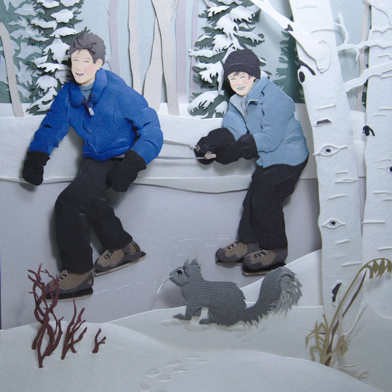 paper sculpture of two young skaters on a lake- one towing the other, by Beth Mehall